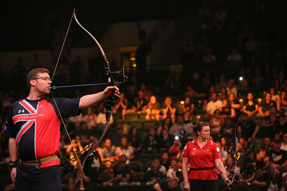 Man Disabled Person Competing in Archery Web