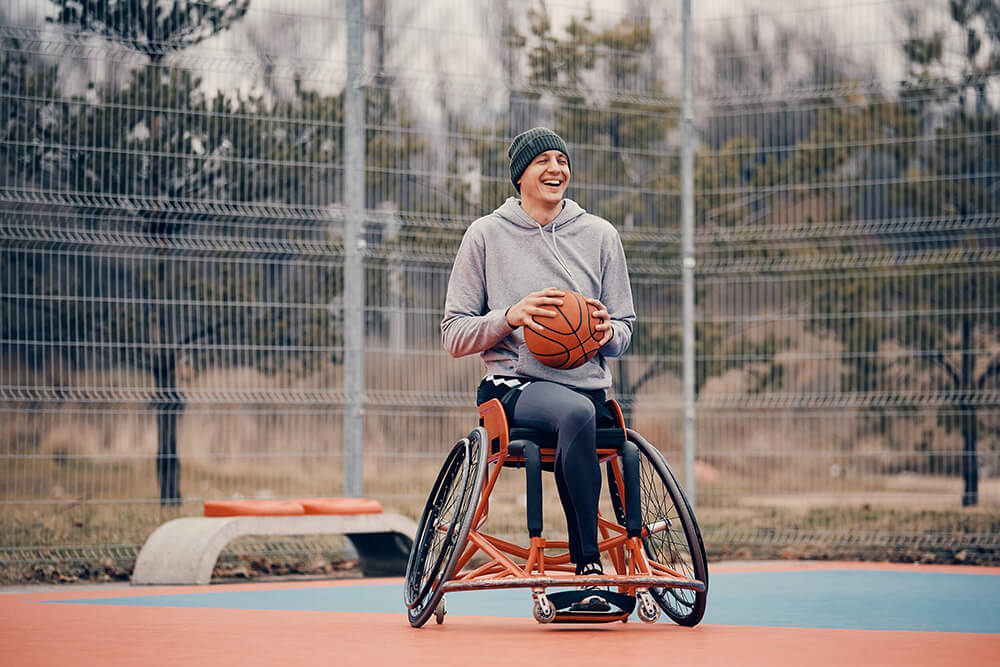 Woman in Wheelchair Playing Sports Web