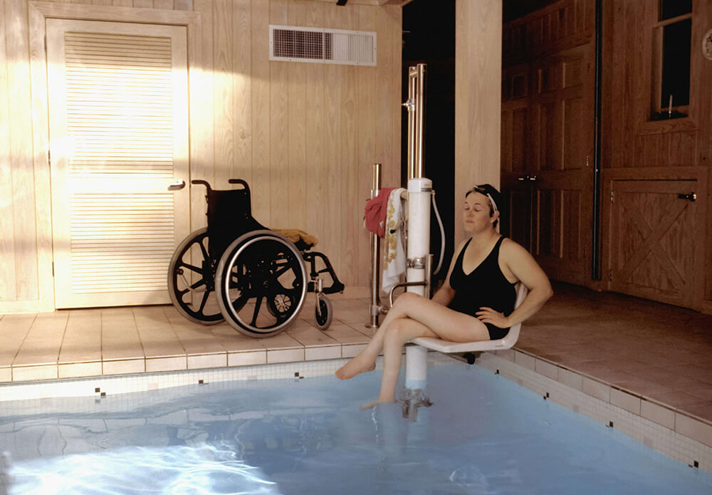 Woman Wheelchair User at the Swimming Baths Web